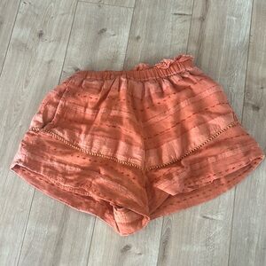 Free people xs orange shorts. Run a little big